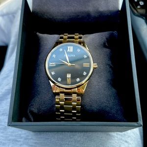 Gold Bulova diamonds watch, brand new never worn once, original package